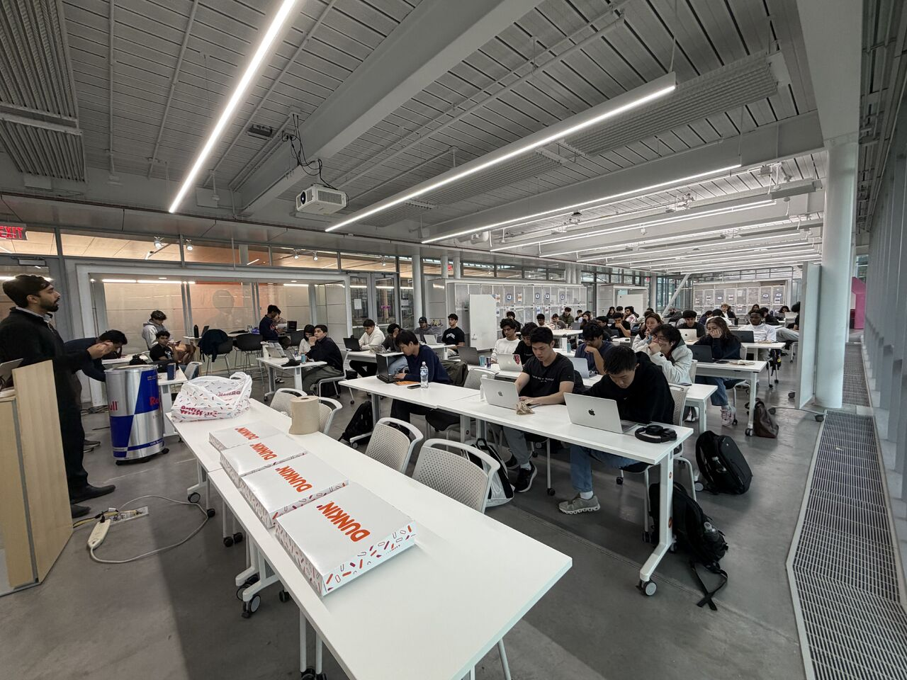 A packed Agentic AI lecture at the SCD building — rows of students at laptops